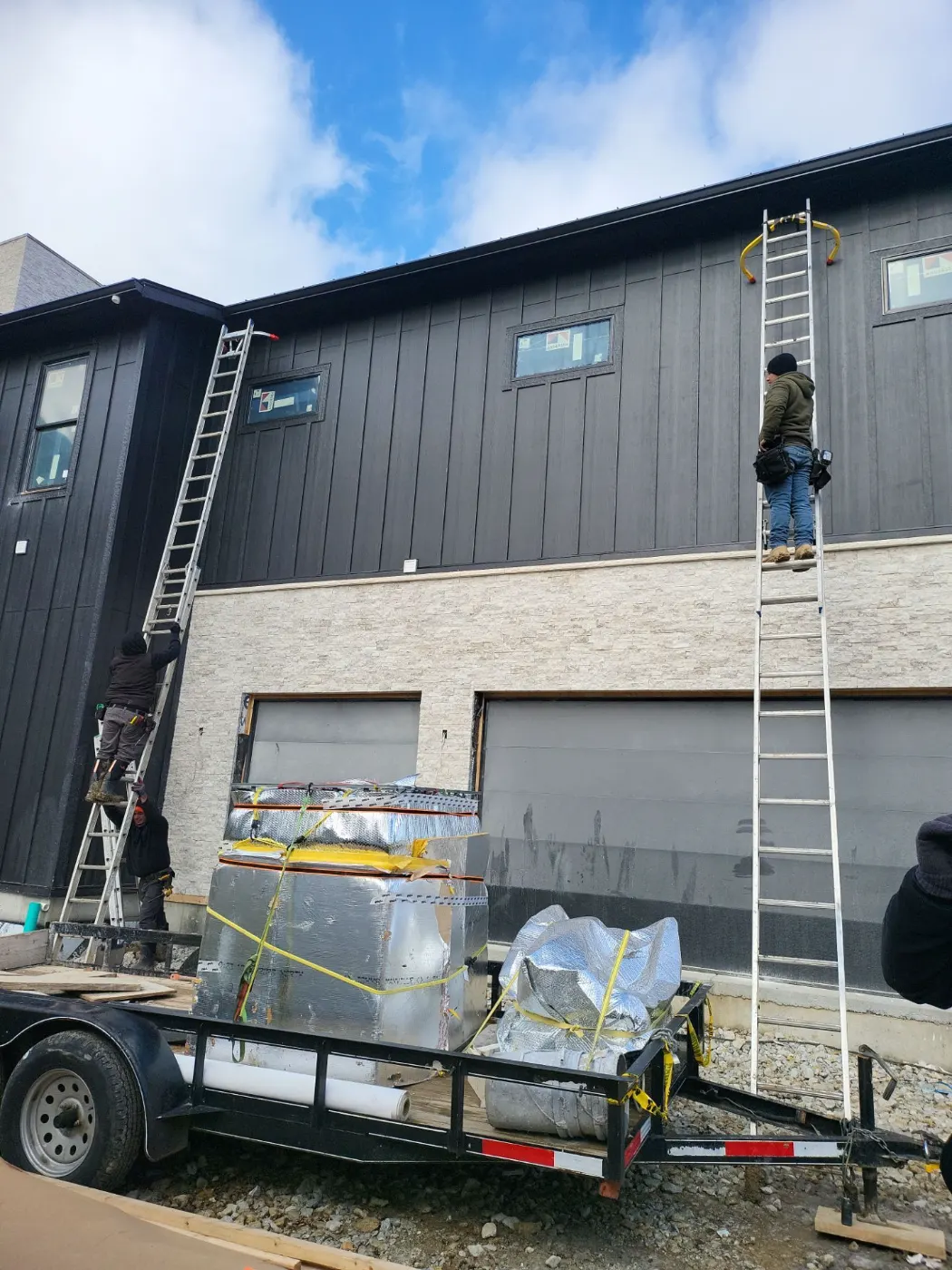 Tarping and dry-in on a Crooked Creek commercial roof
